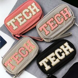 This TECH bag acts as a wristlet/purse.